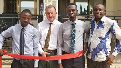 Joe Cutting the Ribbon with Leaders